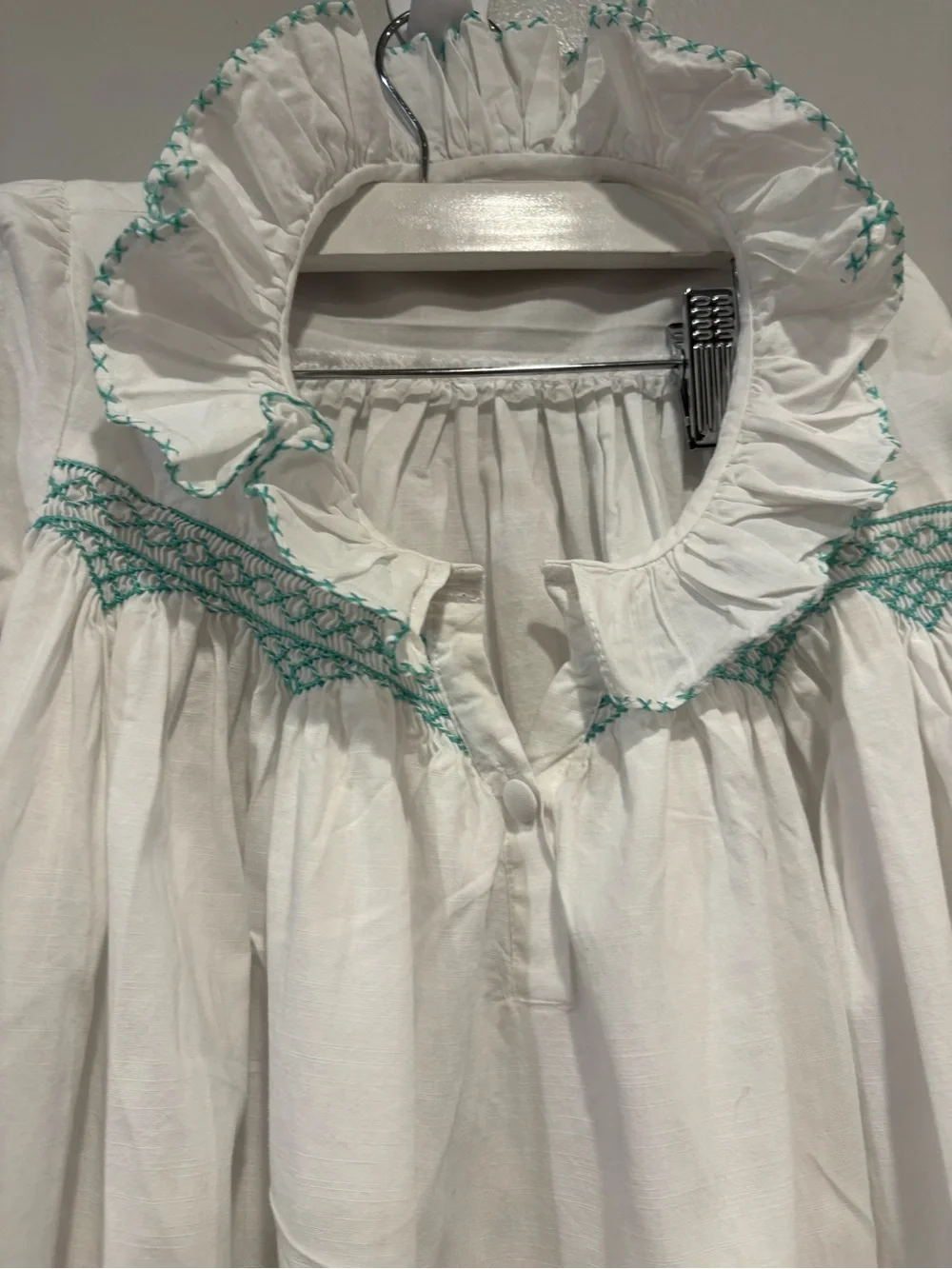 White Girls' Long Sleeve Dress with Mint Smocking Detail Hand Smocked.